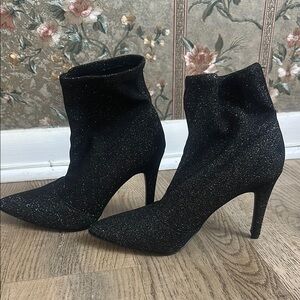 Brash Black Heeled Boots with Sparkly Finish